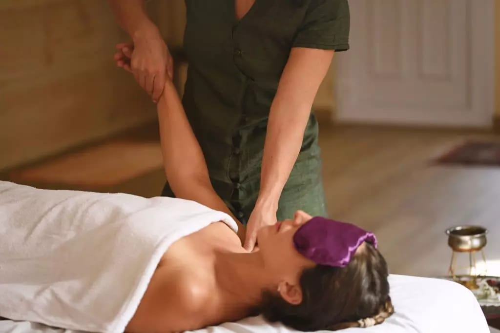 Female patient receiving Tui na massage